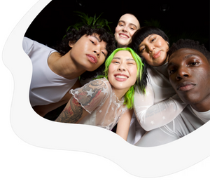 Models of varying skin tones smile with glowing skin.